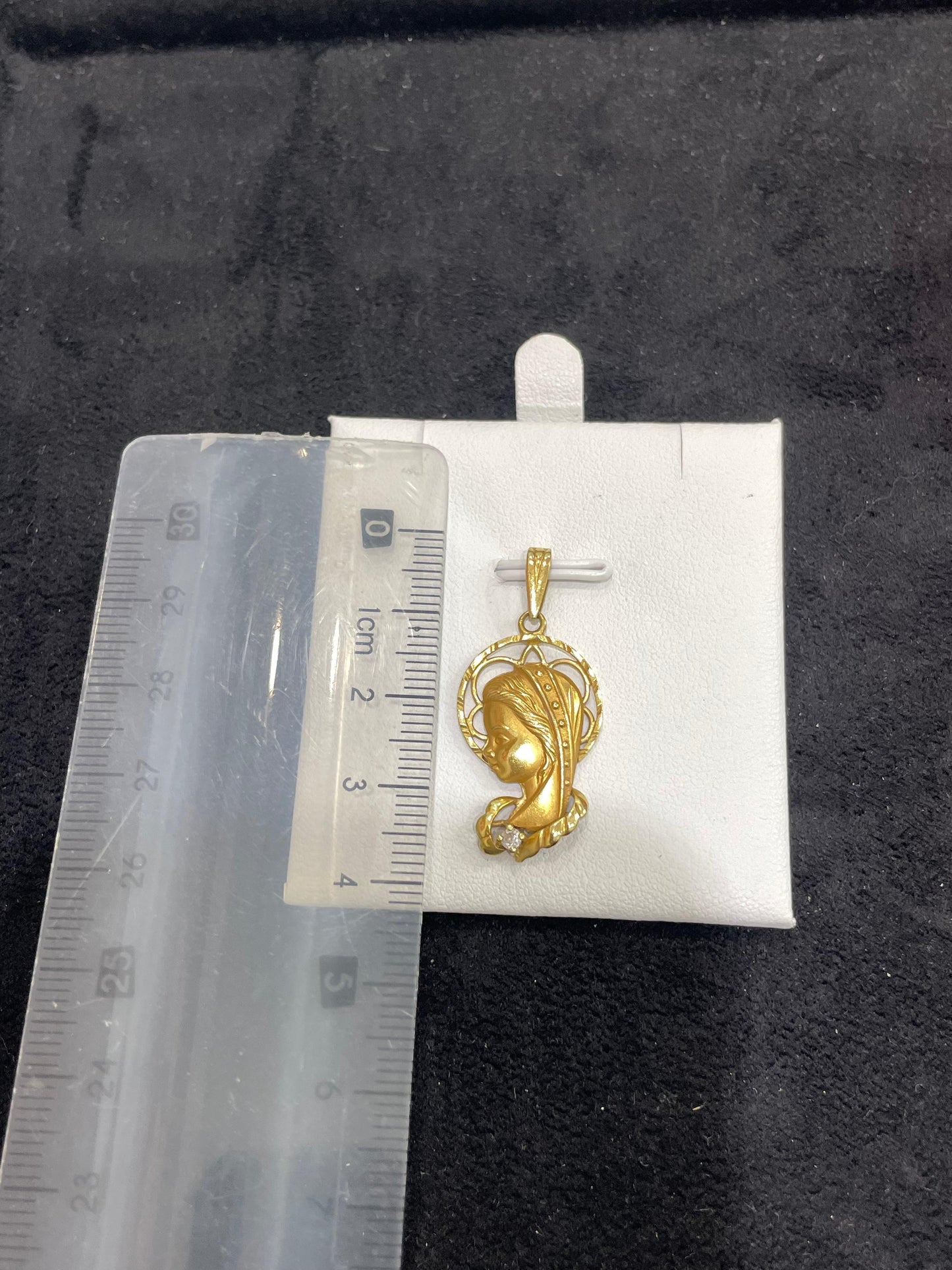 Colgante de oro 18Kt de segunda mano