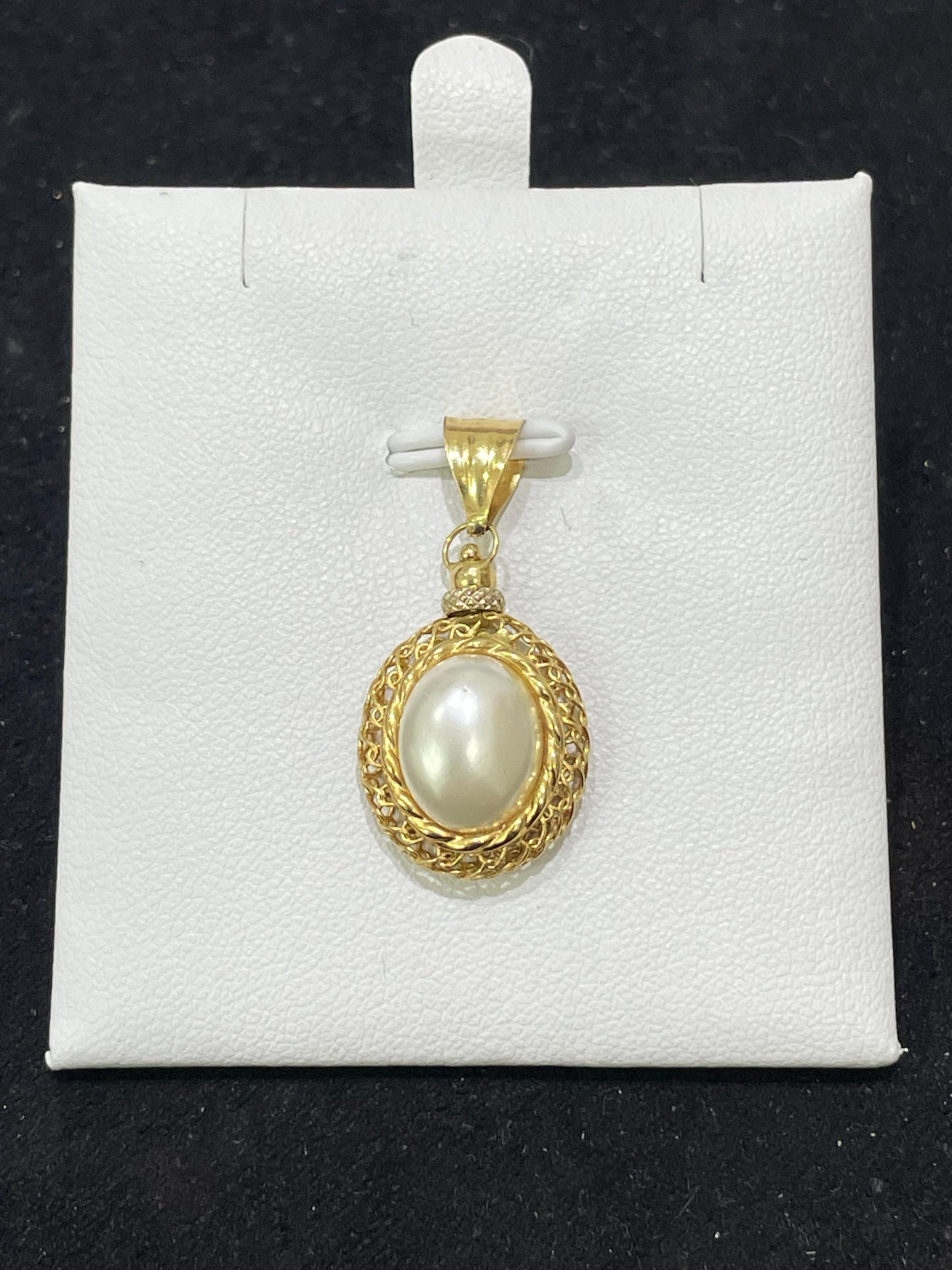 Colgante de oro 18Kt de segunda mano