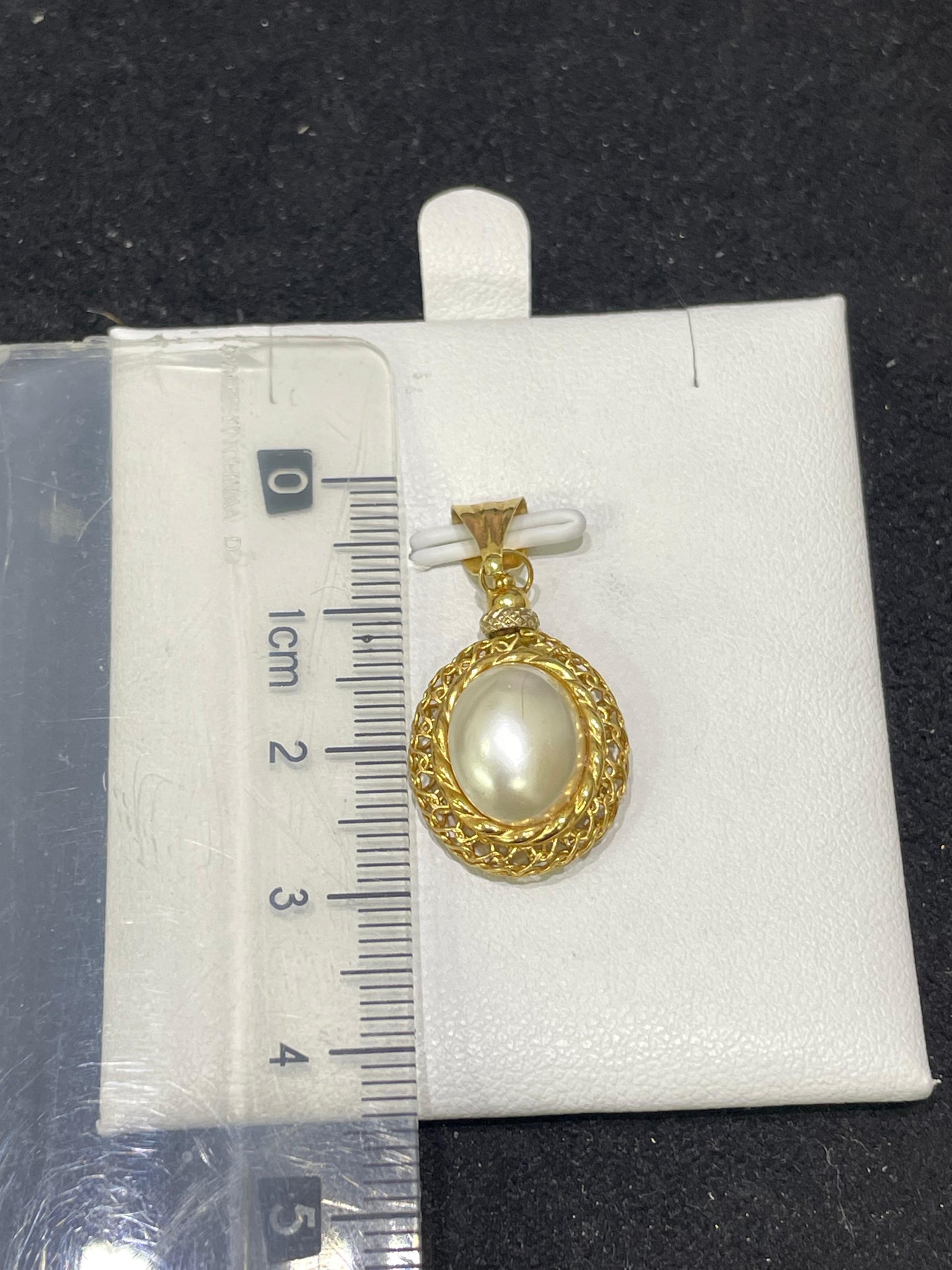 Colgante de oro 18Kt de segunda mano