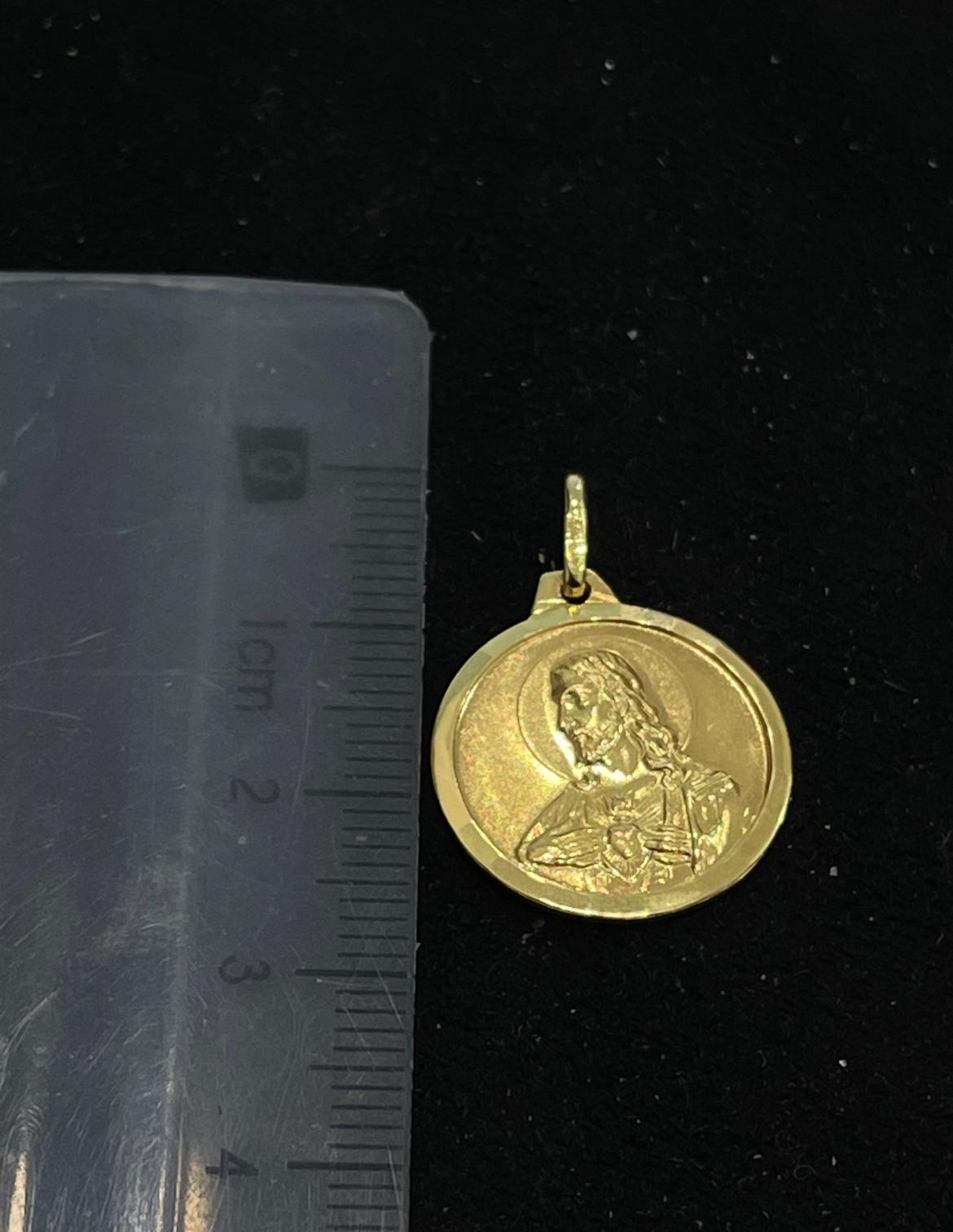 Colgante de oro 18Kt de segunda mano